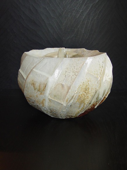 Oval covered Tanba water storage jar with ash glaze covering diagonal banding, 2011