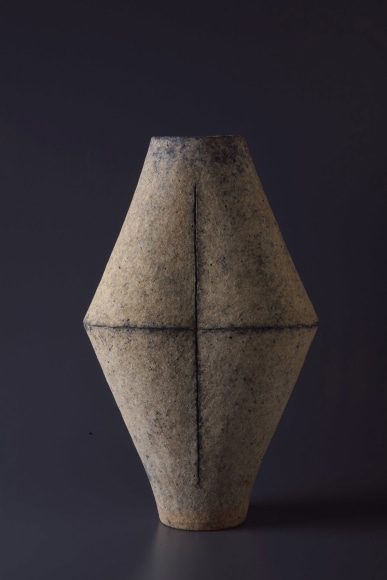 Multi-ﬁred, diamond-shaped vessel with center seam and scored vertical line, 