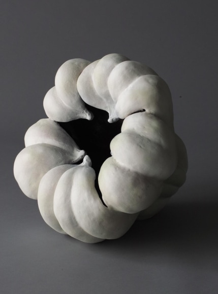Sculpture in the form of a pumpkin with matte glazes in white