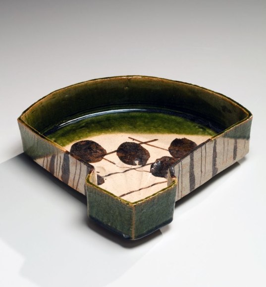Oribe-type glazed fan-shaped dish with motif of skewered mochi