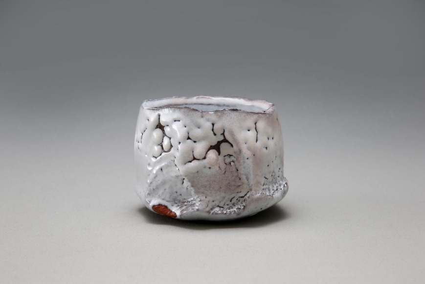 Straight walled teabowl with jagged rim, kairagi, or crawling, Hagi white glaze, and kiln effects, 2014