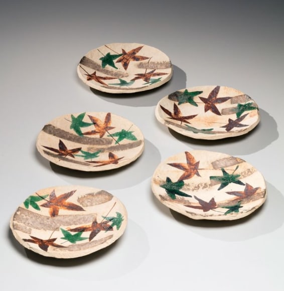 Five circular plates decorated with polychrome maple leaves and silver streaks (ginsai momiji)