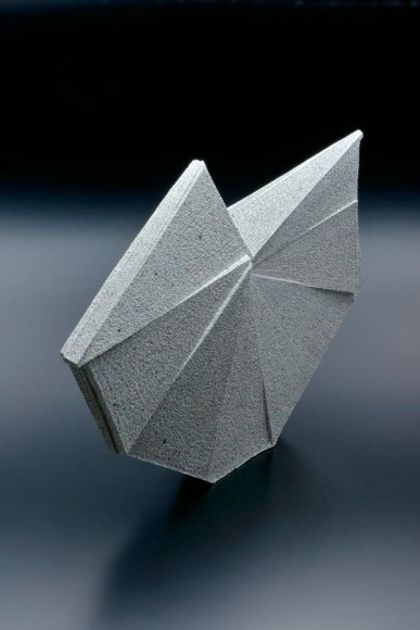 Large horizontal multi-faceted sculpture with recessed upper side, 2012