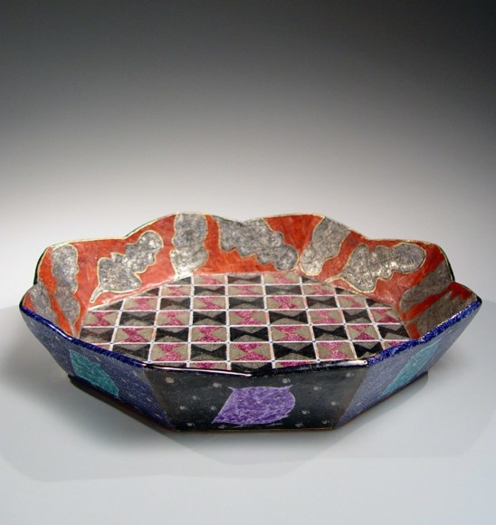 Scalloped, low-sided plate with geometrical oak leaf designs and owls on the exterior, 1980