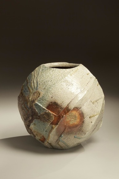 Spherical Tanba vessel with faceted diagonal banding and dripping natural ash glaze and markings from impressed shells, 2011