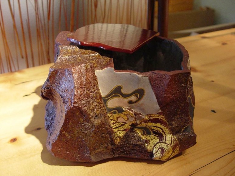 Mizusashi with brown lacquered wood lid, red clay, decorated with a rimpa-style wave design, 2011