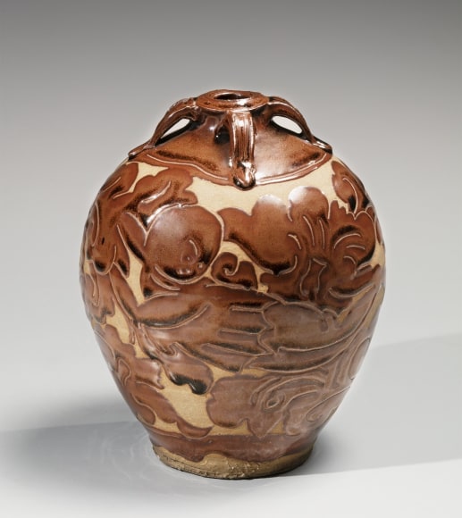Ovoid vase with Chinese-inspired patterning of a small doll surrounded by foliage&nbsp;, ca.1923-25