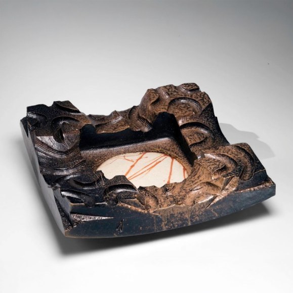 Bizen square platter with deeply recessed center with hidasuki (straw burn mark), surrounded by heavily carved border in black Bizen