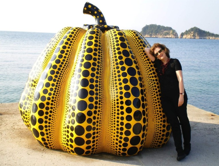 Art dealer Joan Mirviss at the museum island of Naoshima in 2013. The pumpkin sculpture is by contemporary artist Yayoi Kusama (b 1929). A traveling exhibition of the artist&rsquo;s work remains at the Hirshhorn Museum and Sculpture Garden in Washington, DC, through May 14.