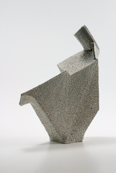 Multi-faceted sculpture with two sides extended over the mouth with colored clay inlays (#2)