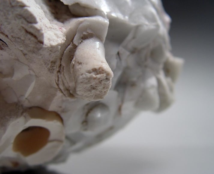 Abstract sculptural form that has been &ldquo;excavated&rdquo; from a larger form with molten glaze in pale green, molten exterior and rough powdery glazed interior, ca.2000-2005