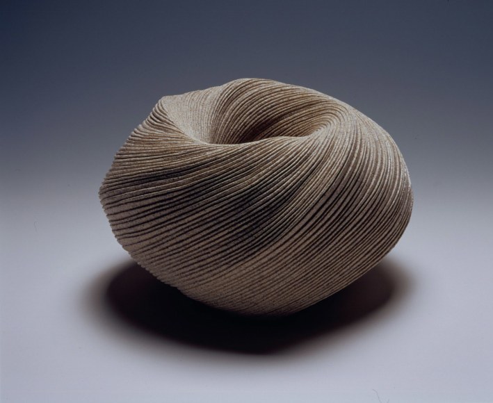 Ovoid vessel with diagonally incised cascading folds
