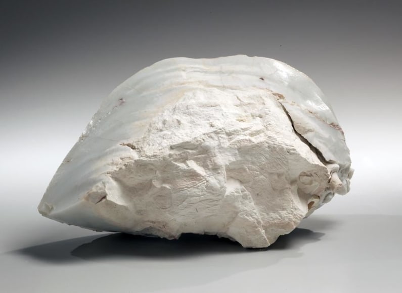 Abstract sculptural form that has been &ldquo;excavated&rdquo; from a larger form with molten glaze in pale green, molten exterior and rough powdery glazed interior, ca.2000-2005