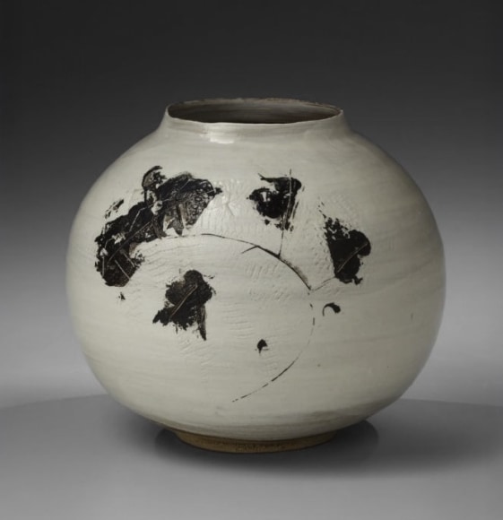 White and black glazed vase