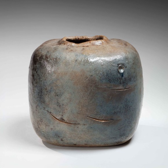 Irregularly rounded square vessel with slashed curves