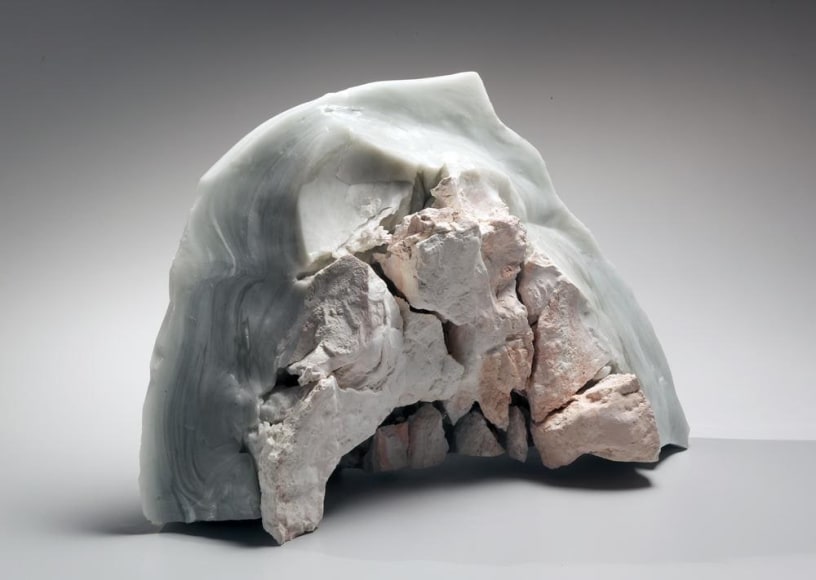 Standing abstract sculptural form that has been &ldquo;excavated&rdquo; from a larger form with molten glaze in pale green and smooth molten back; jagged mouth-like interior with embedded pre-fired porcelain; ca. 2000-2005