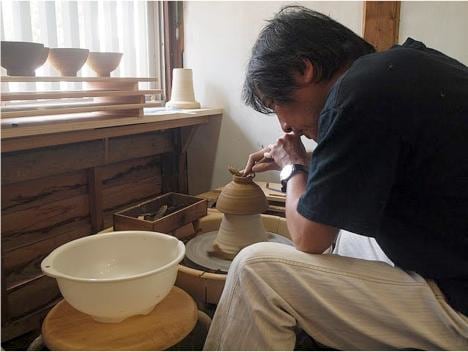 Kondo Takahiro works on creating a vessel 