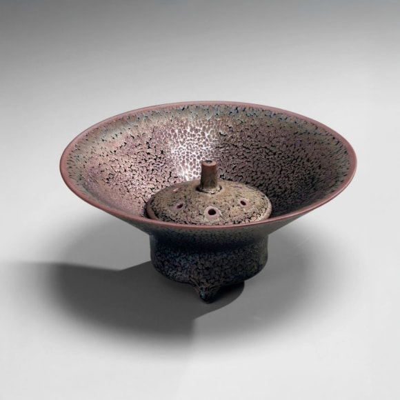 Sparkling purple tenmoku round incense burner with wide outspread mouth, recessed punctuated knobbed cover and tubular, footed base, 2016