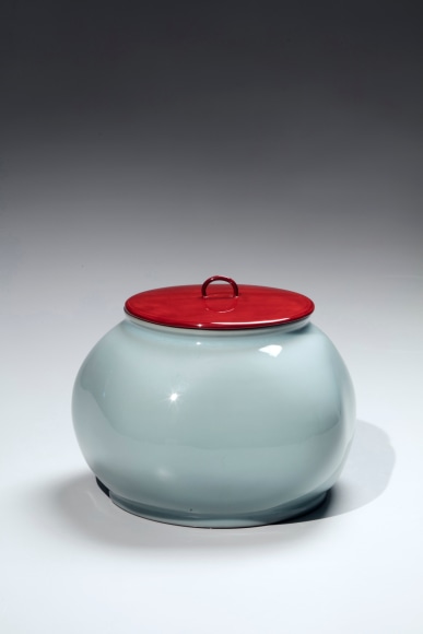 Kawase Shinobu (b. 1950)  Gently lobed celadon waterjar with red lacquer cover.  2002  Porcelainous stoneware with celadon glaze  6 1/4 x 7 5/8 in.  21.2 x 13.9 cm.  Inv# 10362
