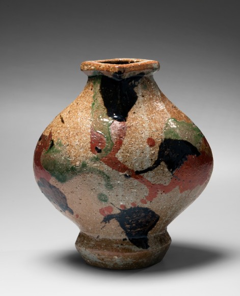 San&ccedil;ai flattened vessel (henko) with flaring mouth and red, green and black iron-oxide glazes, ca. 1960