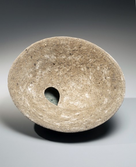 Conical concave sculpture with teardrop shaped perforation, 2010