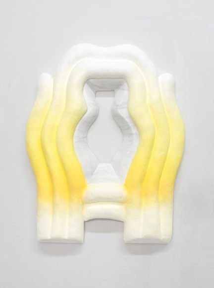 symmetrical wall sculpture by Lauren Clay
