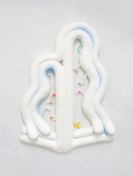 asymmetrical wall sculpture by Lauren Clay