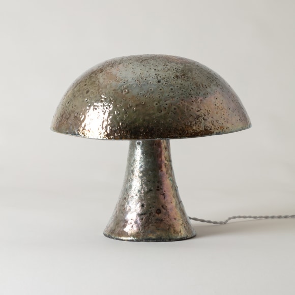 Lamp with a silvered raku glaze