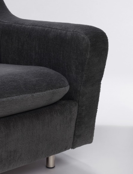 Upholstered sofa detail of arm