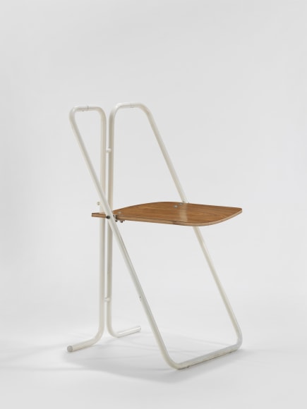 Plywood and white lacquered tubular metal chair in front of white background
