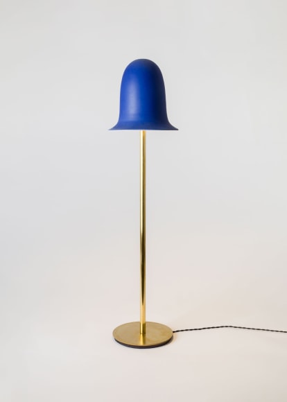 minimal lamp in an empty room