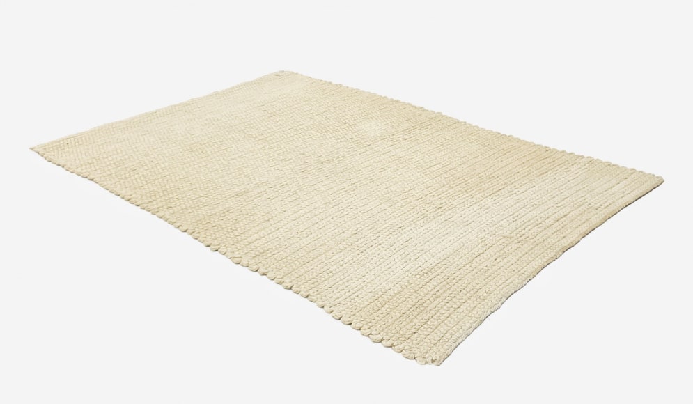 Linen woven piece laid flat on the ground by Sheila Hicks