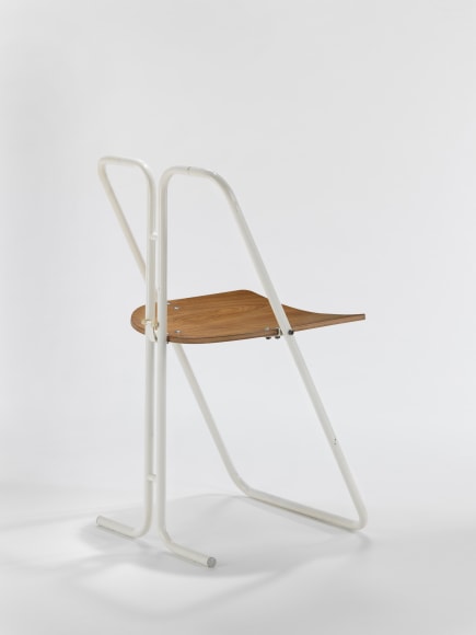 Plywood and white lacquered tubular metal chair in front of white background
