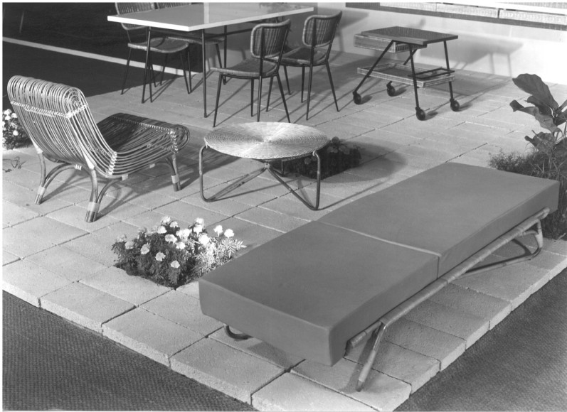 Archival image of similar model exhibited, Salon des Artistes D&eacute;corateurs. 1956, Paris. Top was originally made of rattan with niche underneath to store small objects.