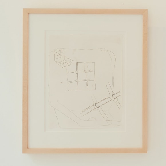drawing of a drain by Robert Gober hangs on a gallery wall