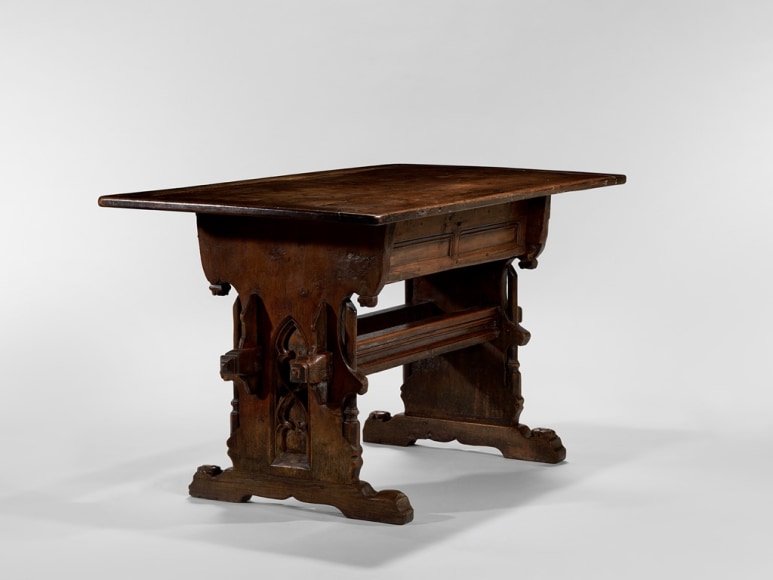 picture of medieval table in a gray room
