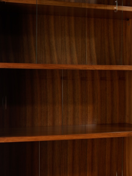 bookcases in an empty room