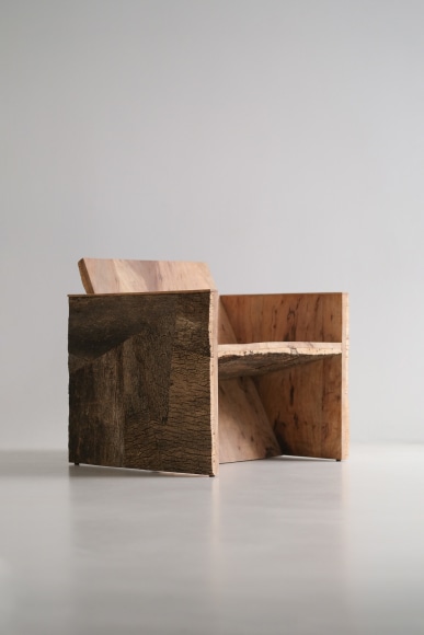 Cork and oak tree chair in a boxy shape by made in situ.