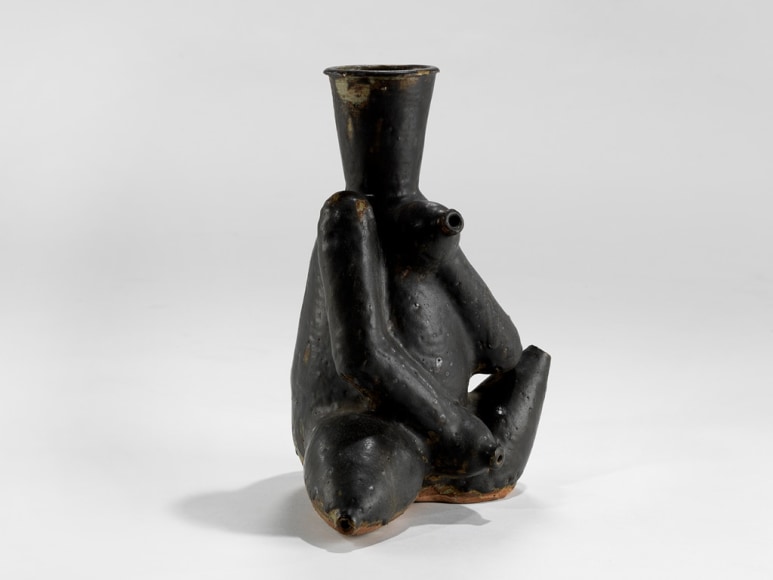 picture of a ceramic sculpture in a grey room