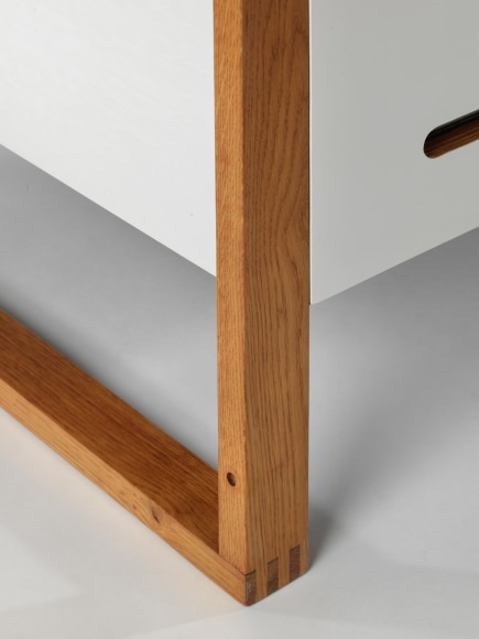 midcentury bed in an empty room