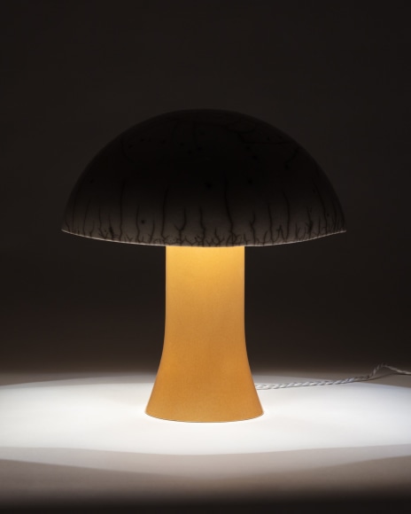 Illuminated lamp with white raku glazed shade and yellow glazed base