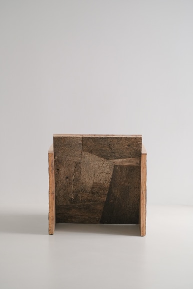 Cork and oak tree chair in a boxy shape by made in situ.