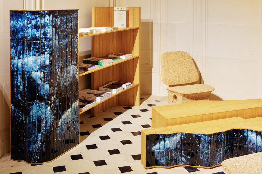 photograph of a bookshelf and chairs in a room