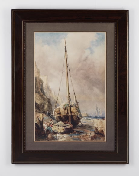 Framed watercolor depicting a beached sailboat and small boat