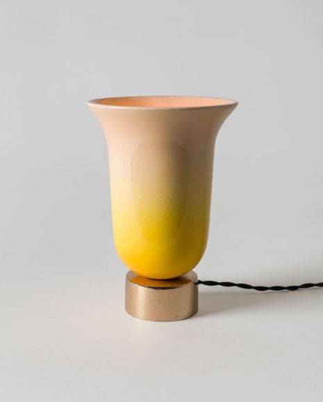 photo of yellow lamp in a gray room