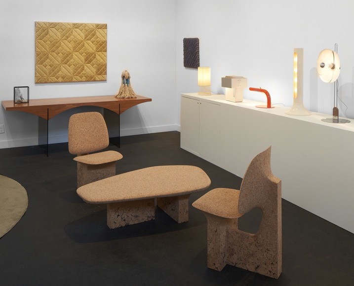 Installation view of Noe Duchafour-Lawarance's burnt cork furniture in the booth at fog.