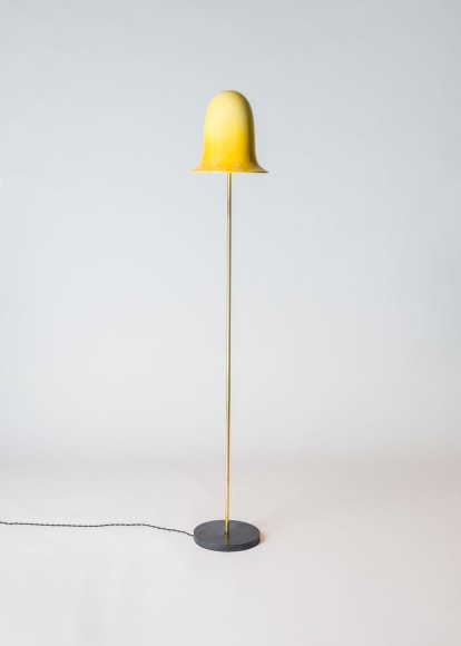 yellow lamp in an empty room