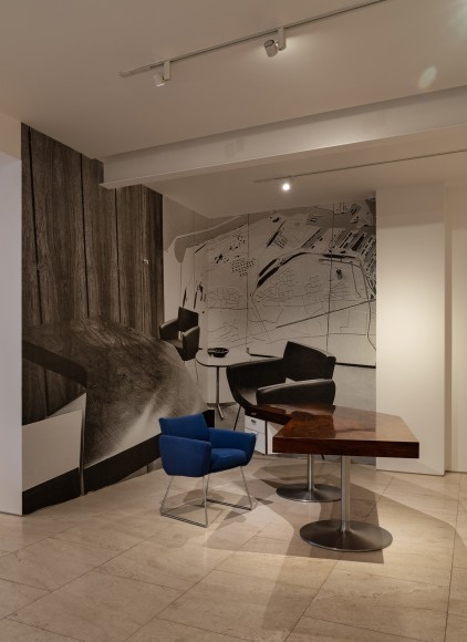 Joseph-André Motte, Desk, 1965, with archival image wall vinyl behind. Photo by Ori Harpaz
