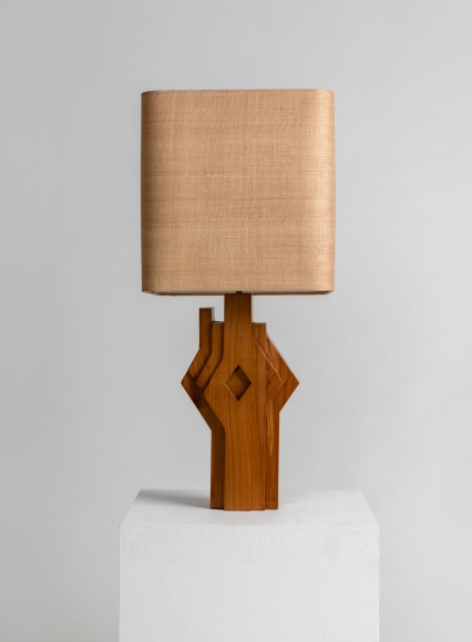 Wood based table lamp with reed shade