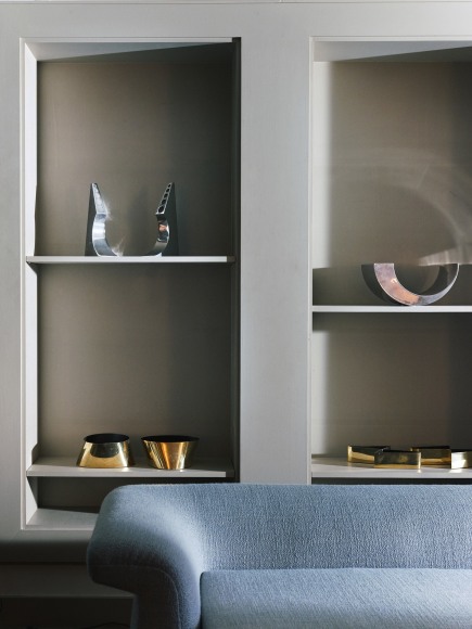 photograph of vases in a room with furniture